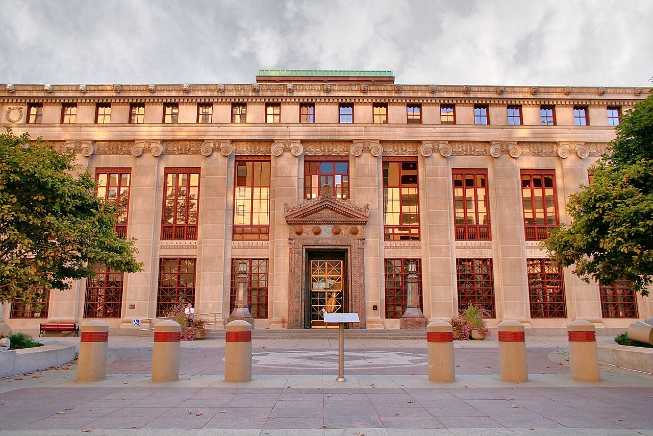 Neoclassical exterior facade of Columbus City Hall with classical pilasters and central entrance.