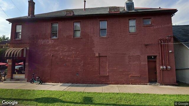 Street-level view toward The Old Mohawk restaurant exterior at 819 Mohawk St and E Kossuth St.