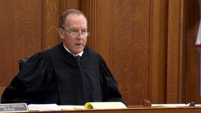 Judge Richard D. Wetzel presiding from the bench in judicial robes in Knox County Common Pleas Court.