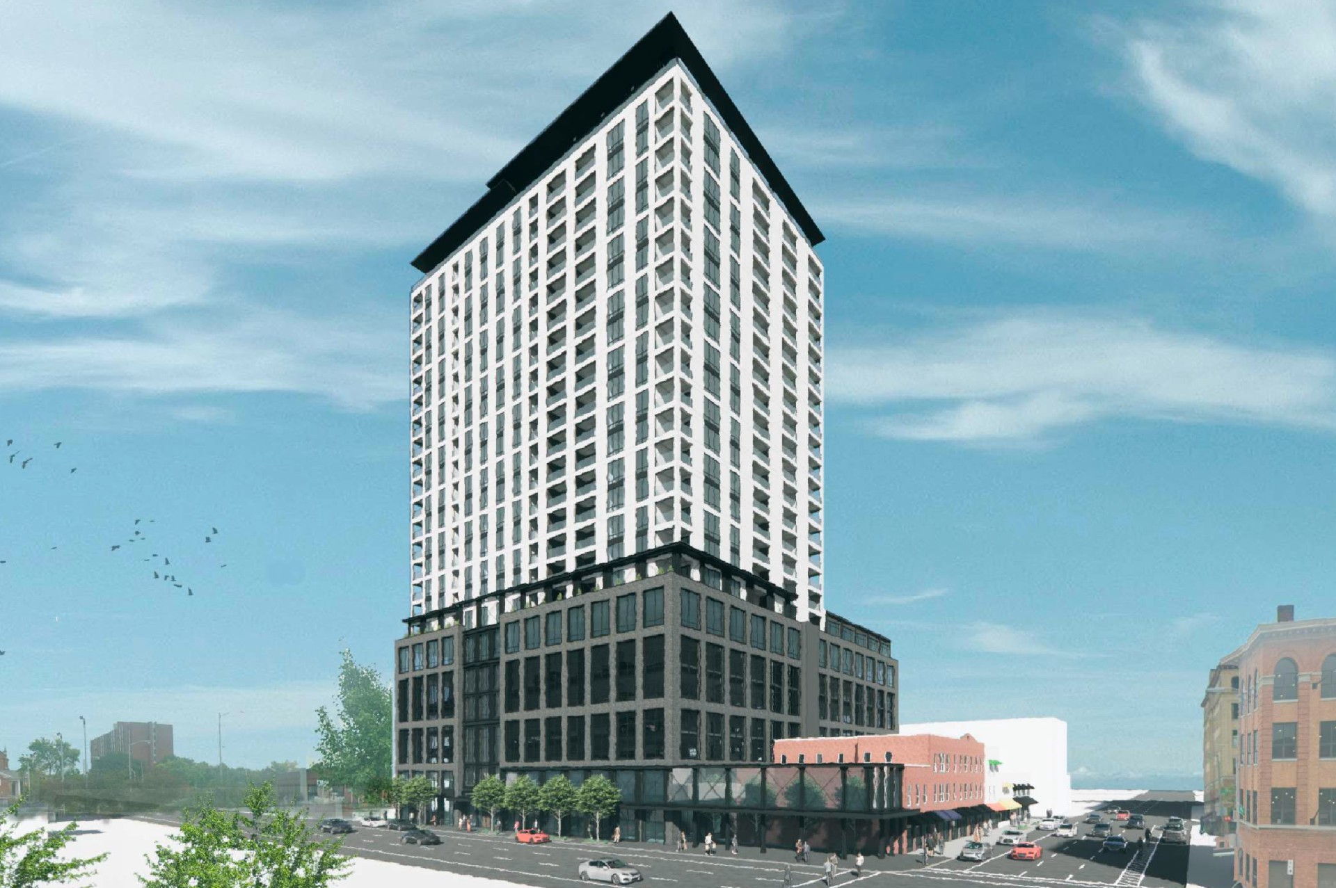 Architectural rendering of The Estrella, showing a multi-story dark masonry podium and white high-rise residential tower in downtown Columbus.